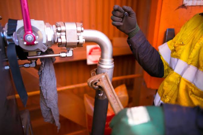 Subcontractor trade crew — plumber servicing site plant